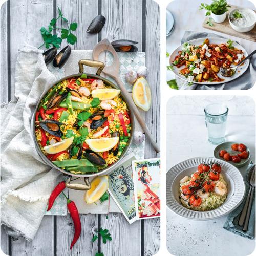 Bunte Paella in einer großen Pfanne